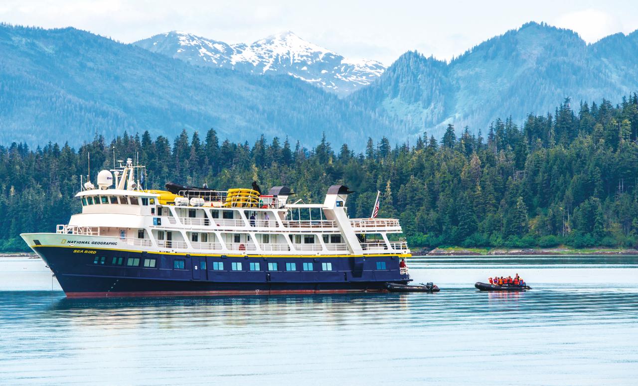 Guests explore by zodiac from the ship National Geographic Sea Bird, Tongass National Forest, Southeast Alaska, USA