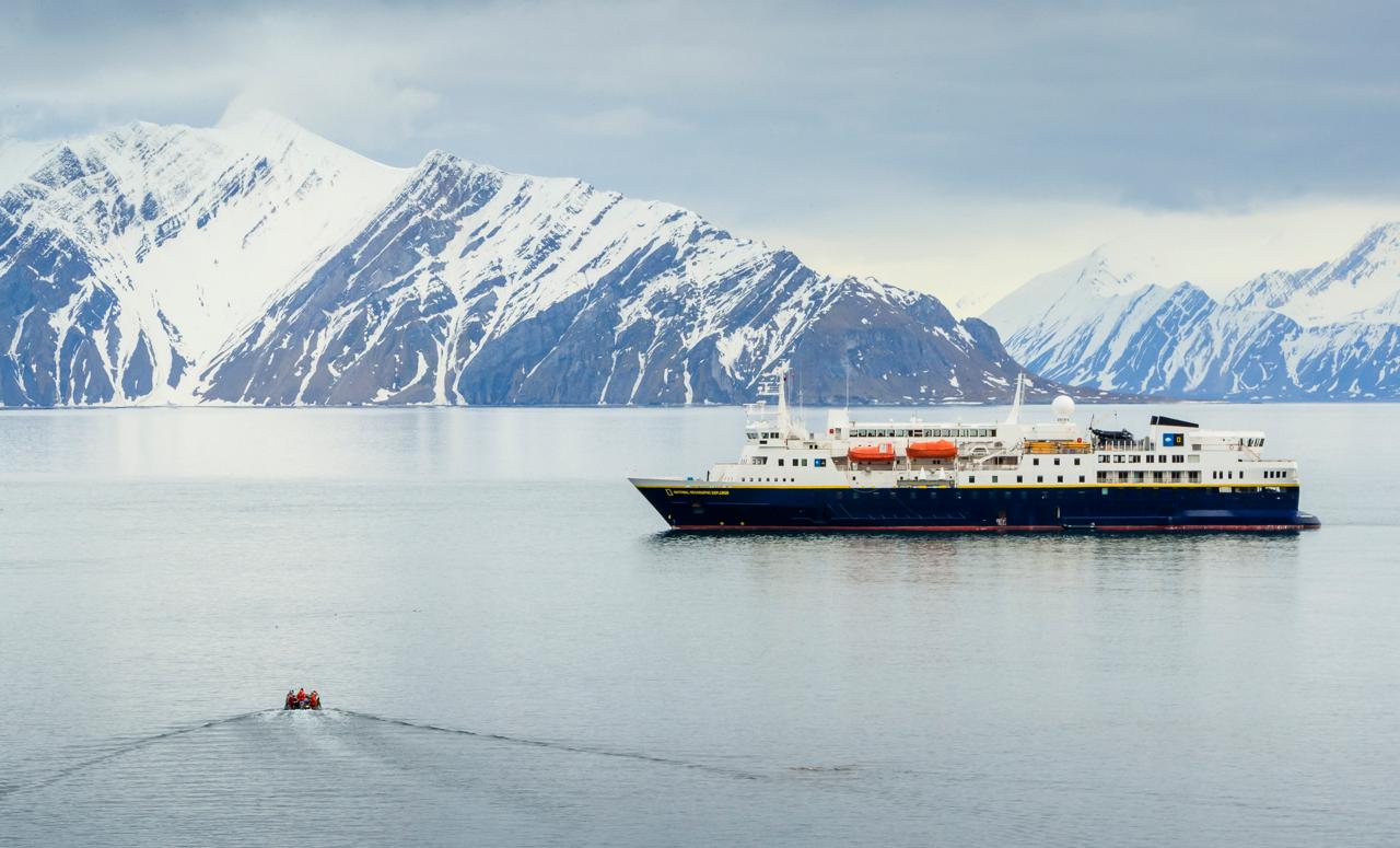 Guests returning back to the ship National Geographic Explorer by zodiac, Spitsbergen, Arctic Ocean, Svalbard, Norway.