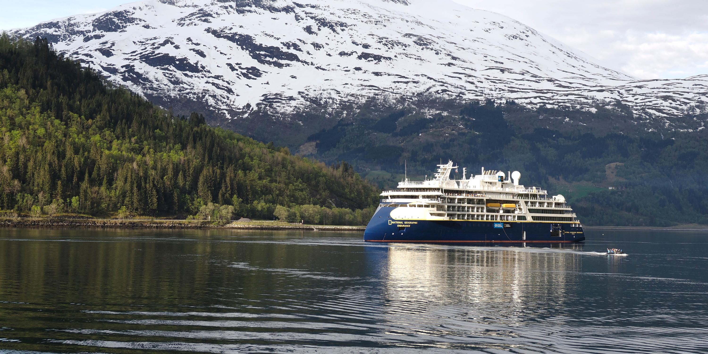 The National Geographic Endurance in Dynamic Positioning near the town of Loen, in Norddfjord, Norway.