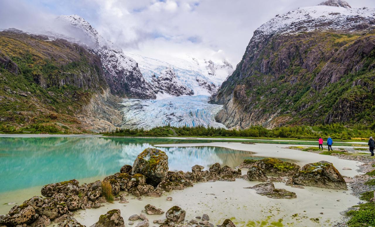 Hiking amidst the awe-inspiring landscapes of Patagonia, with the majestic Bernal Glacier as our stunning backdrop, Chile.