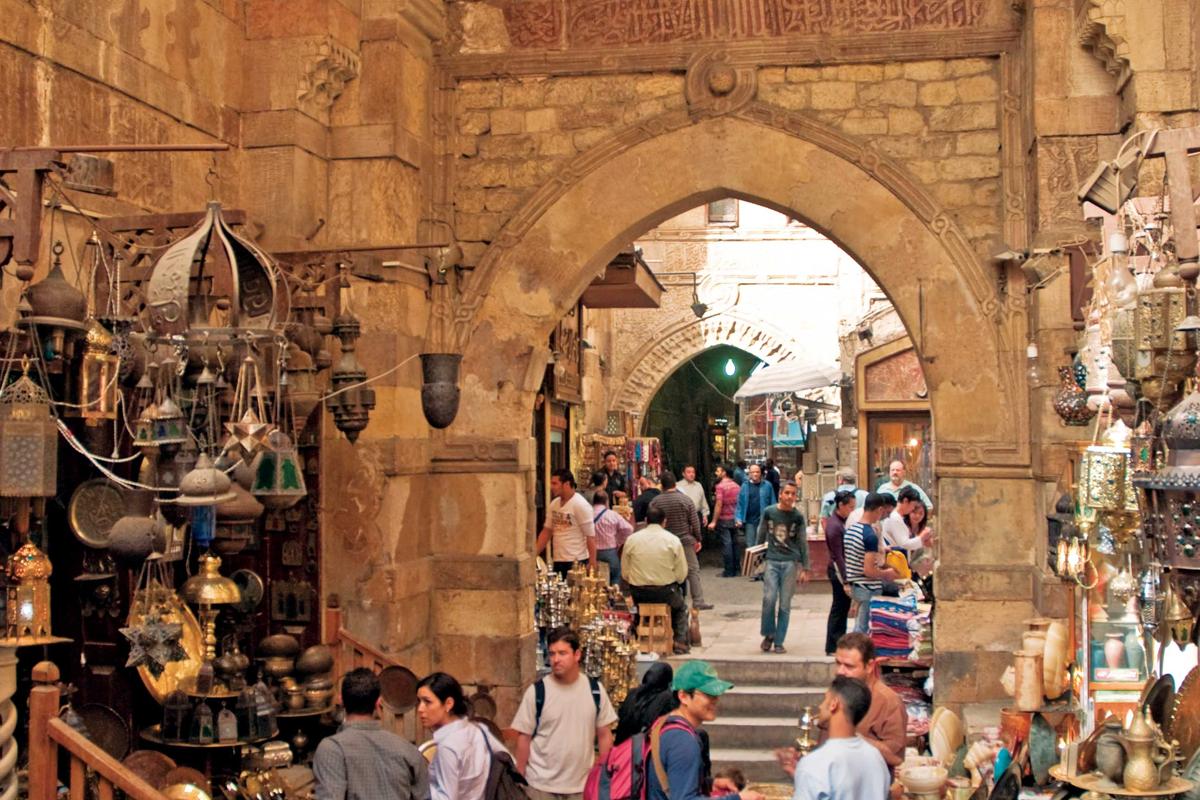 Guests explore Khan el-Khalili the famous bazaar and souq in the historic center of Cairo, Egypt.