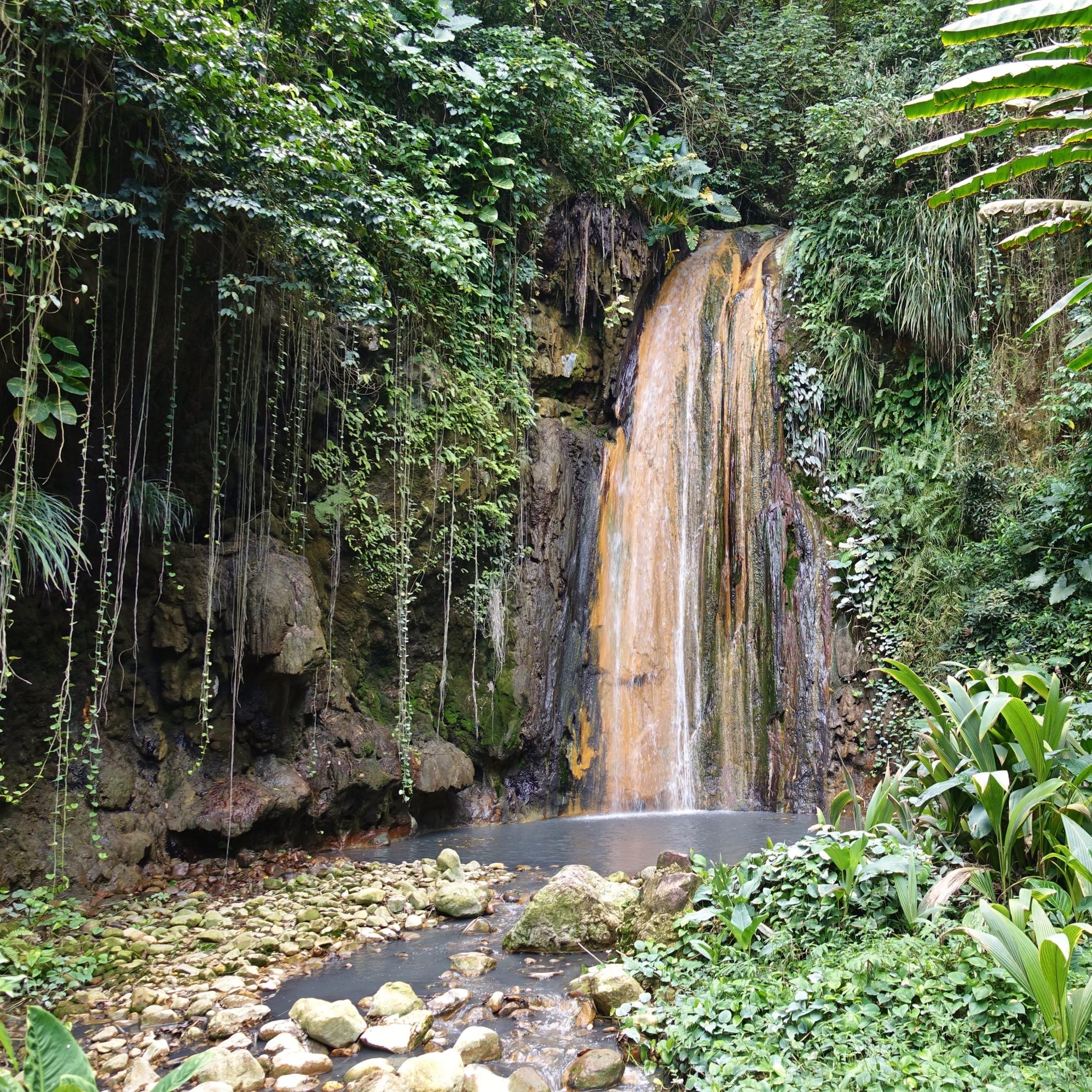 View of the Diamond Waterfall in the Diamond Botanical Gardens in St Lucia