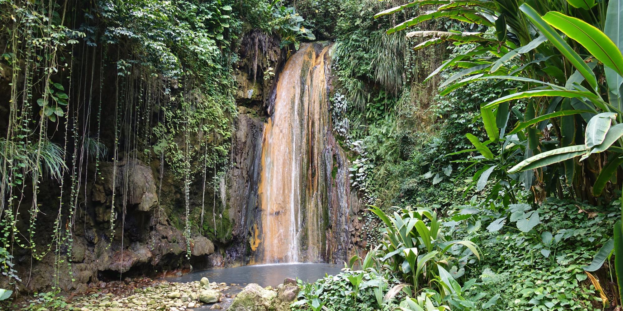 View of the Diamond Waterfall in the Diamond Botanical Gardens in St Lucia