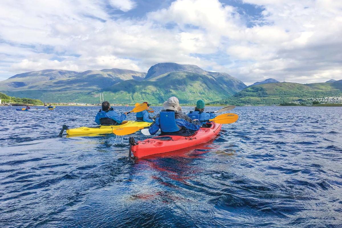 Guests explore by kayak in Scotland.