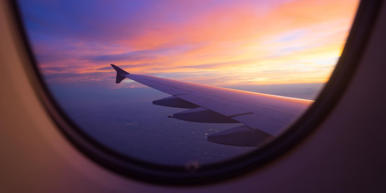 Sunset sky from an airplane window