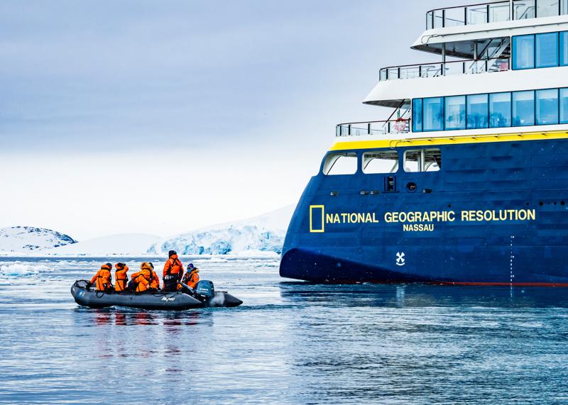 Zodiacs depart the ship National Geogeaphic Resolution, Peterman Island, Antarctica.