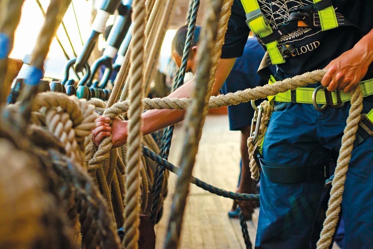 Crew work on the ship Sea Cloud 