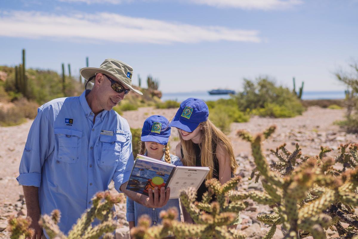 Young guests part of the Global Explores Program adn their guide exploring in San Esteban Island, Gulf of California, Mexico